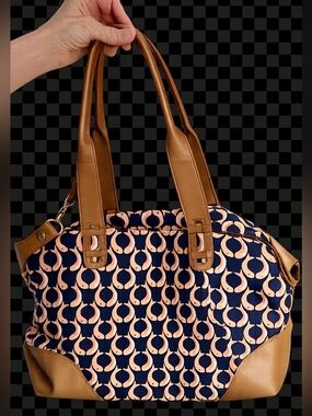 Stella and Dot Koi fish, navy blue tote, used as display excellent condition